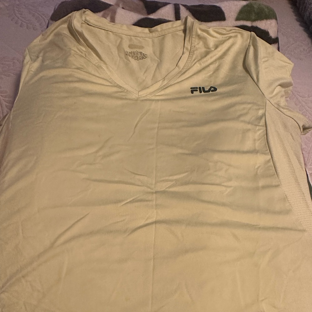 Women’s white workout shirt.